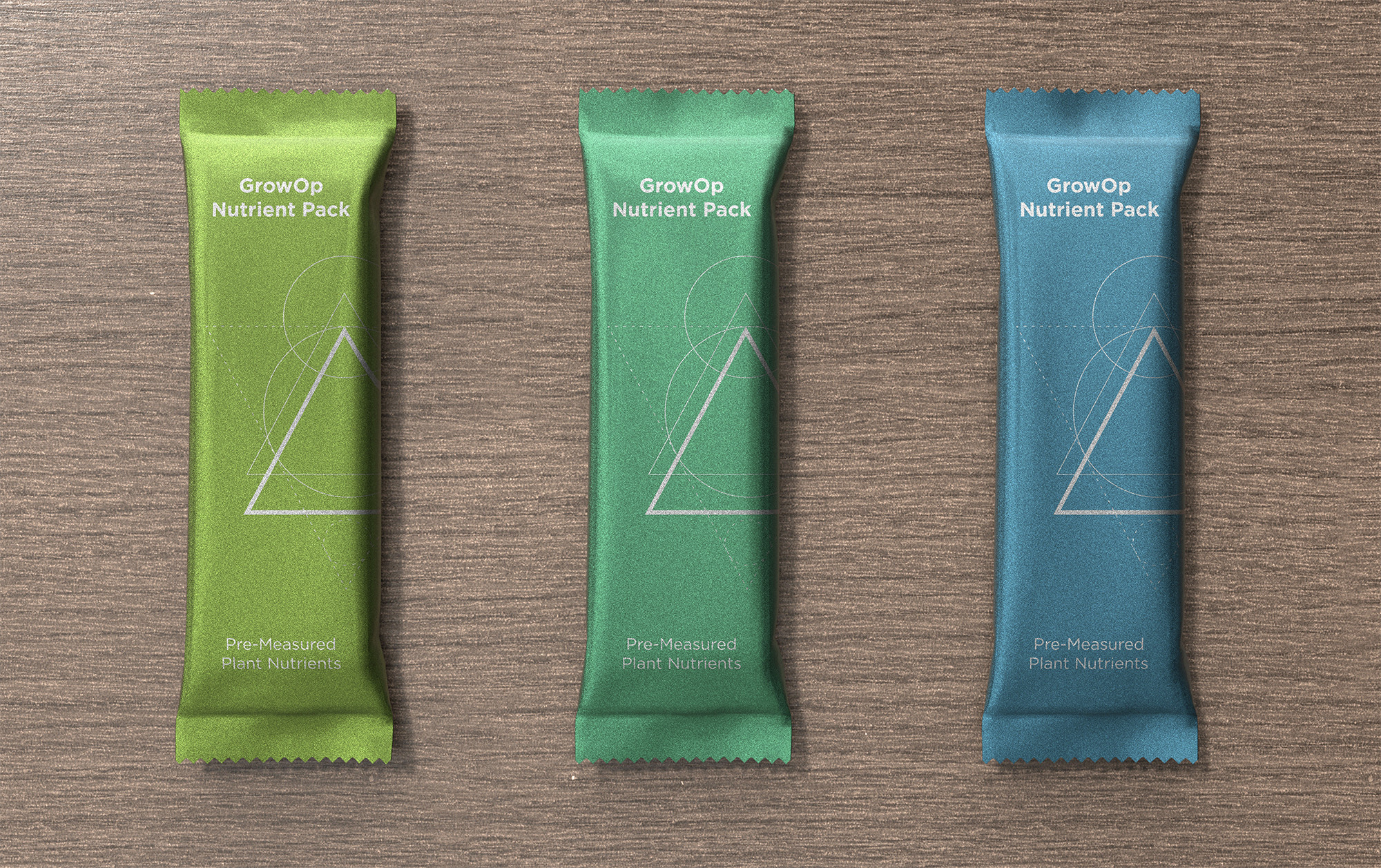 Three color-coded Cryptogrow nutrient packs