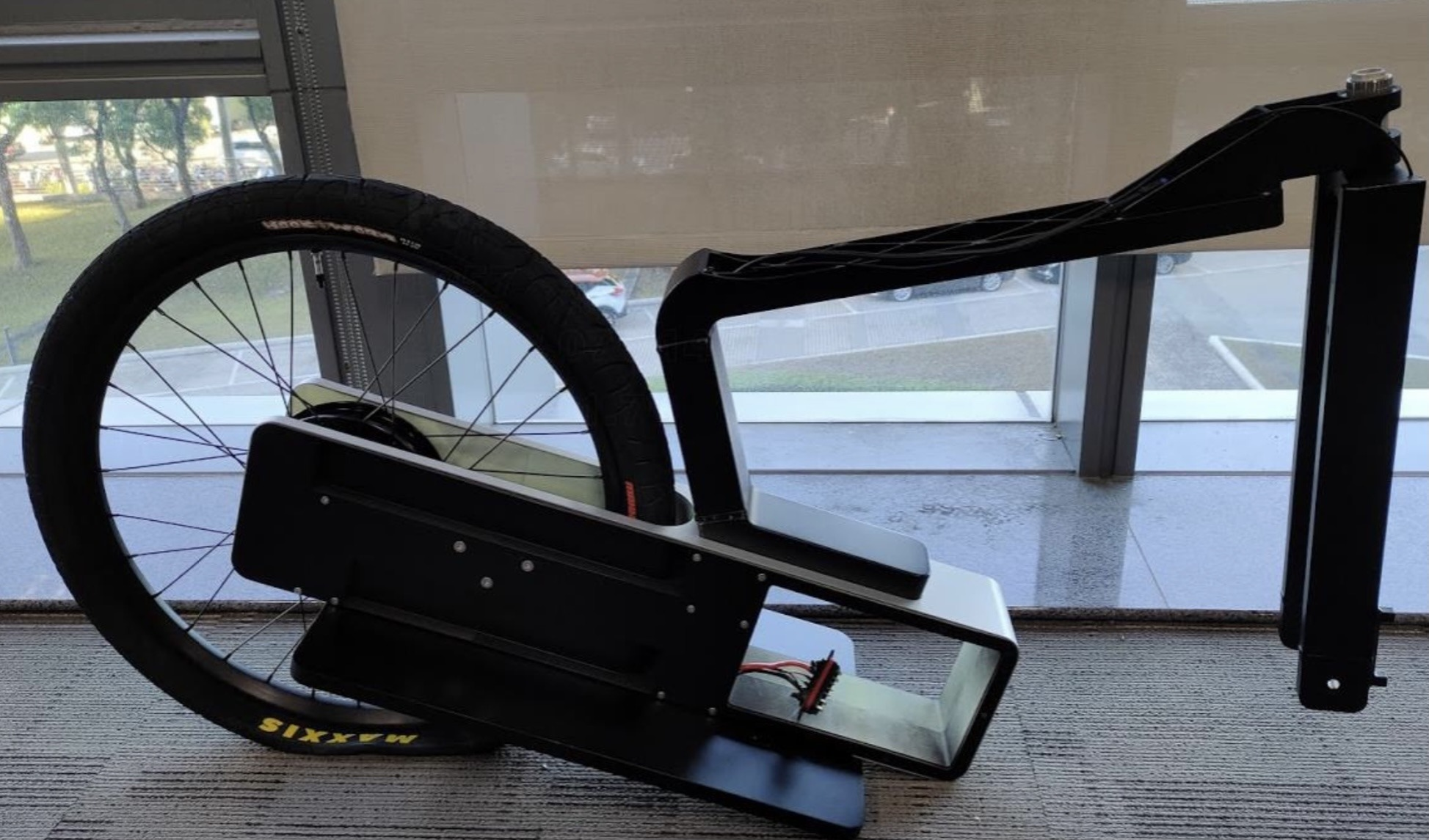 Partially assembled Micromobility startup vehicle frame and wheel package